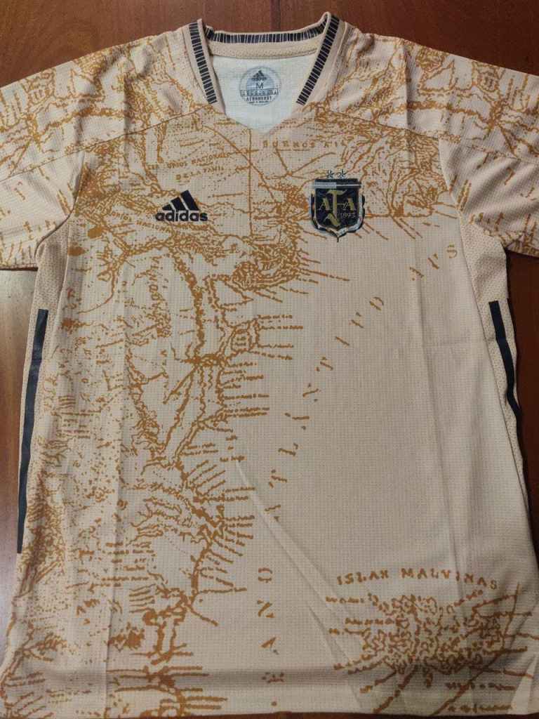 An Argentina concept Football shirt depicting the map of Argentina in a gold/cooper tone. The shirt celebrates 200 years of independence.  